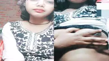 Desi girl in glasses plays with her soft boobs